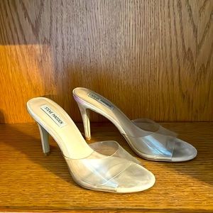 Trendy clear Steve Madden heels perfect for casual or special occasions.